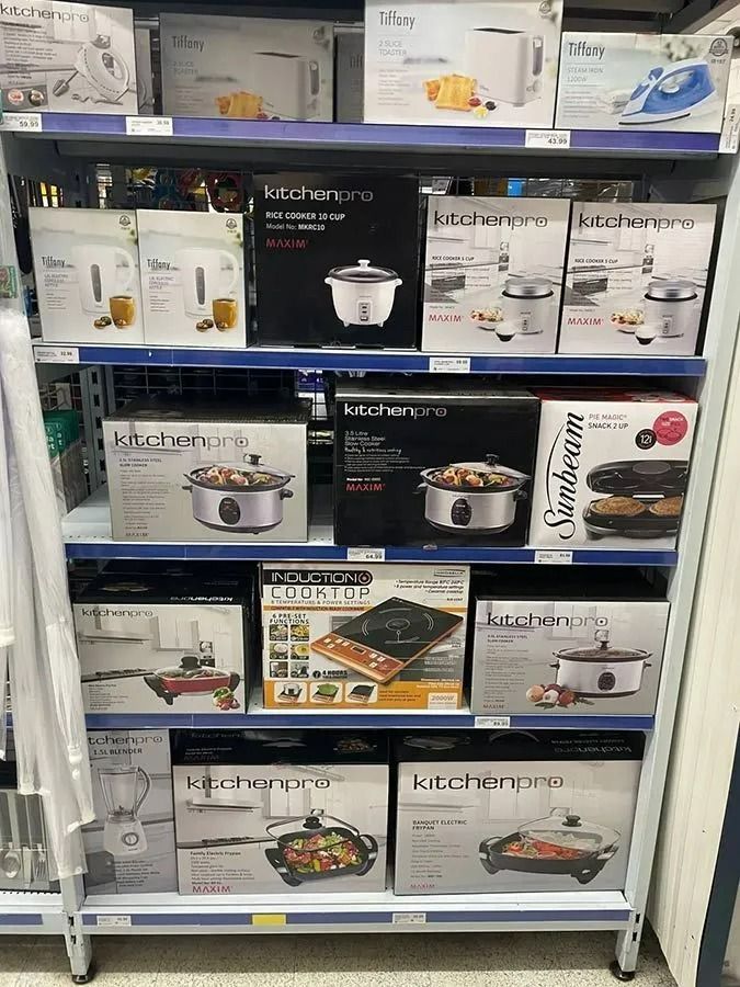 Shelves Stocked With Boxed Kitchen Appliances — Pigglys Supermarket, Takeaway & Bottle Shop in The Gap, NT