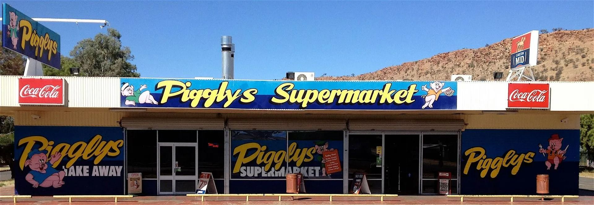Piggly's Supermarket With Blue Signage — Pigglys Supermarket, Takeaway & Bottle Shop in The Gap, NT