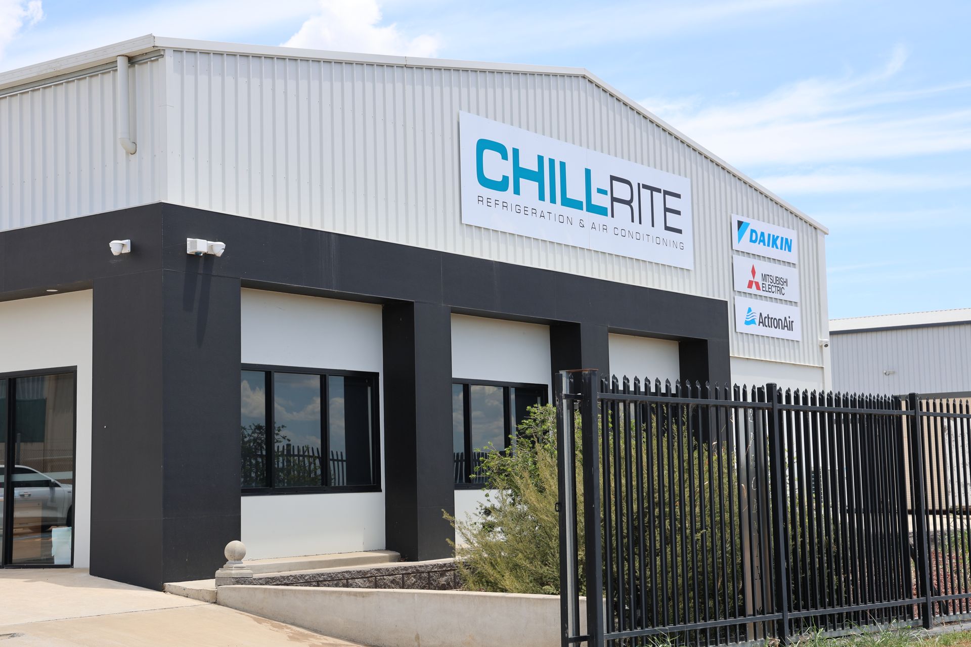 White industrial building with 