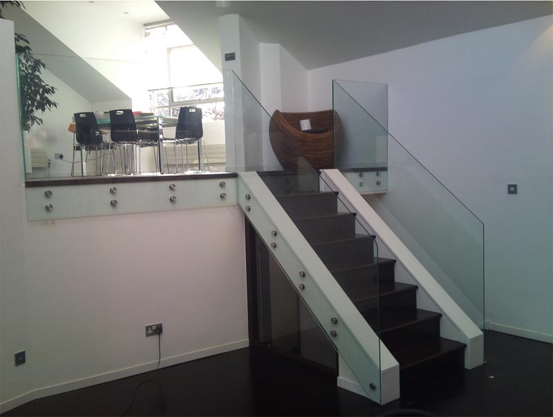 glass balustrades at either side of stairs