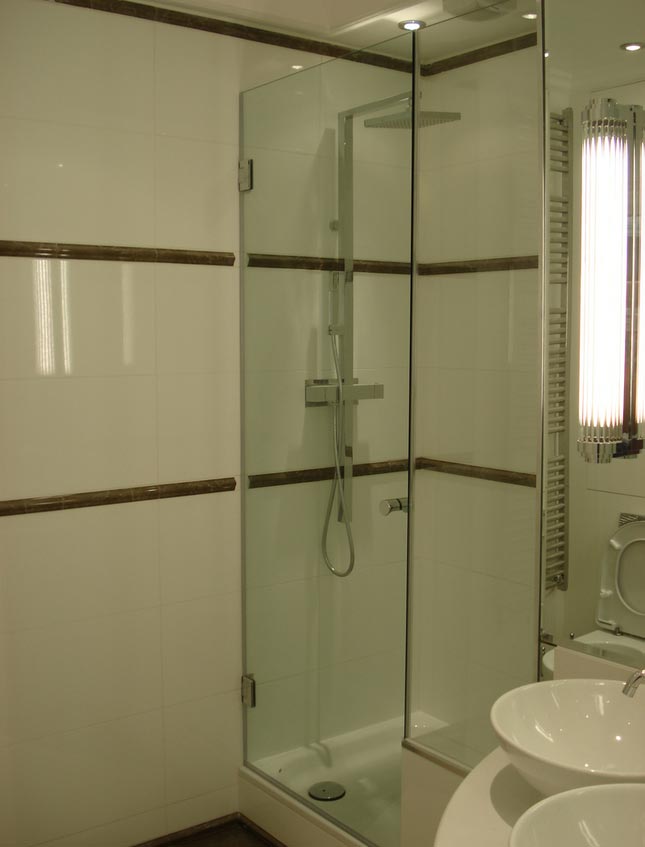 Glass shower surround