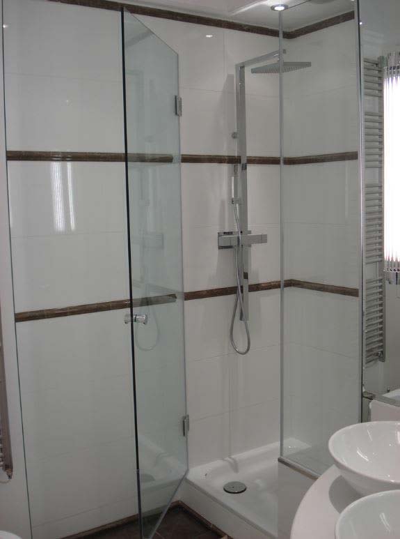 Glass shower surround