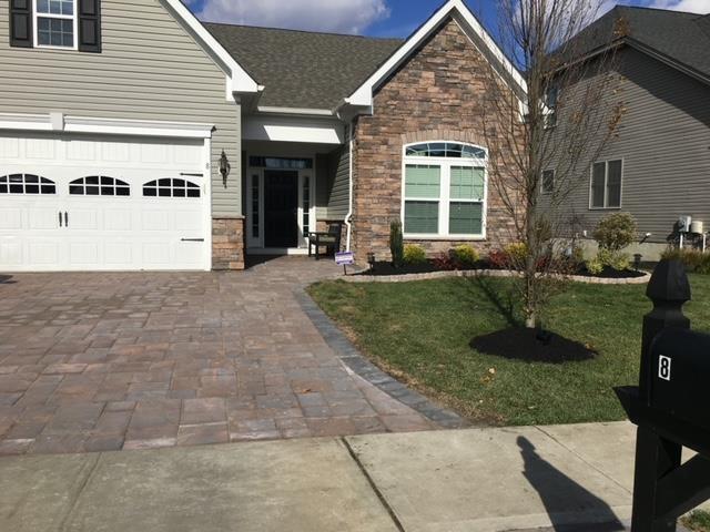 A house with a mailbox in front of it