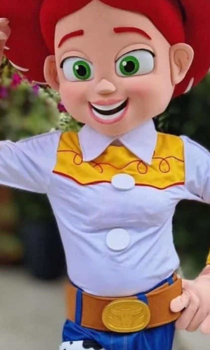 A mascot dressed as jessie from toy story