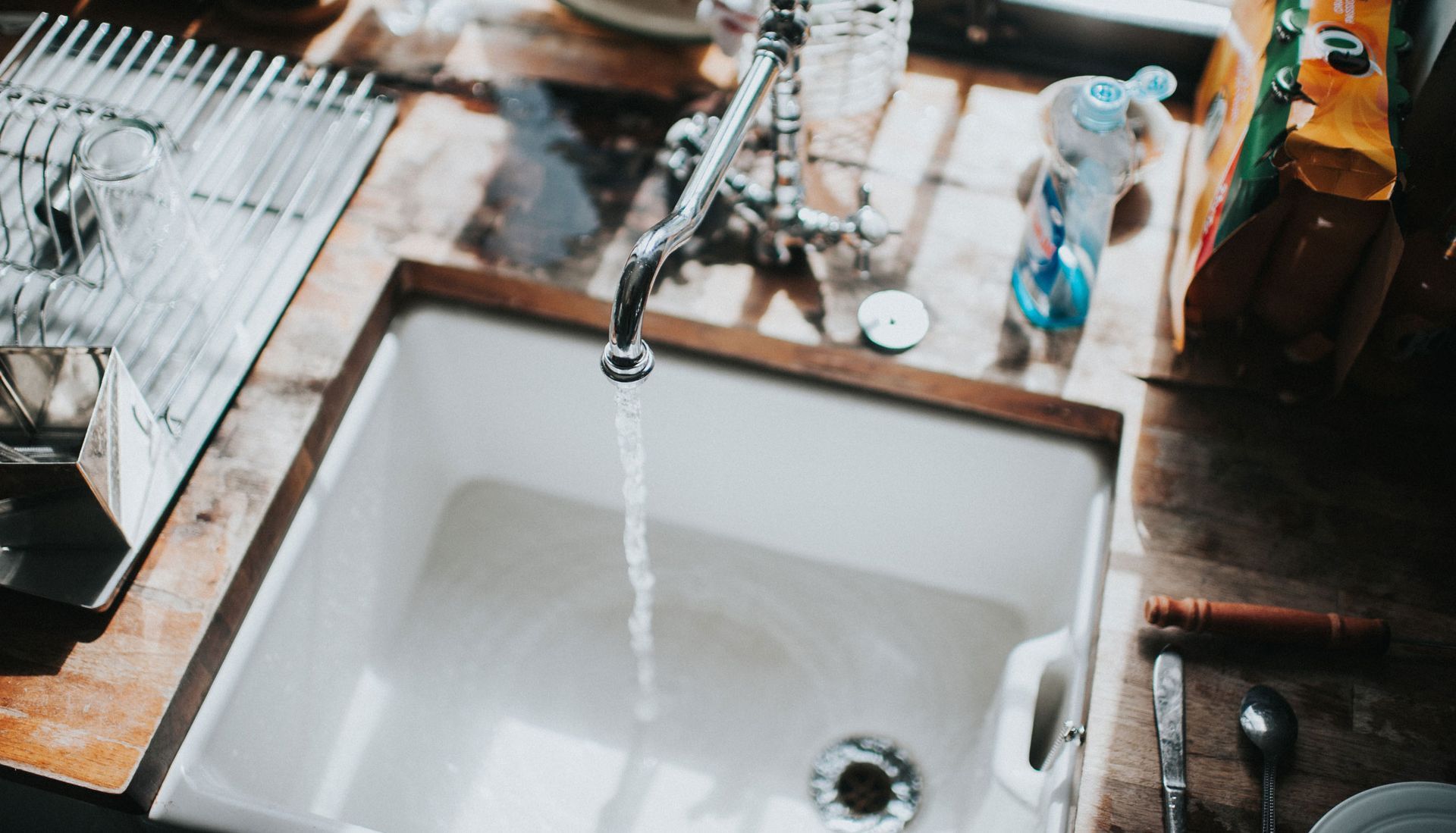 Sink With Running Water — Media, PA — CJ Kelso Plumbing & Heating LLC