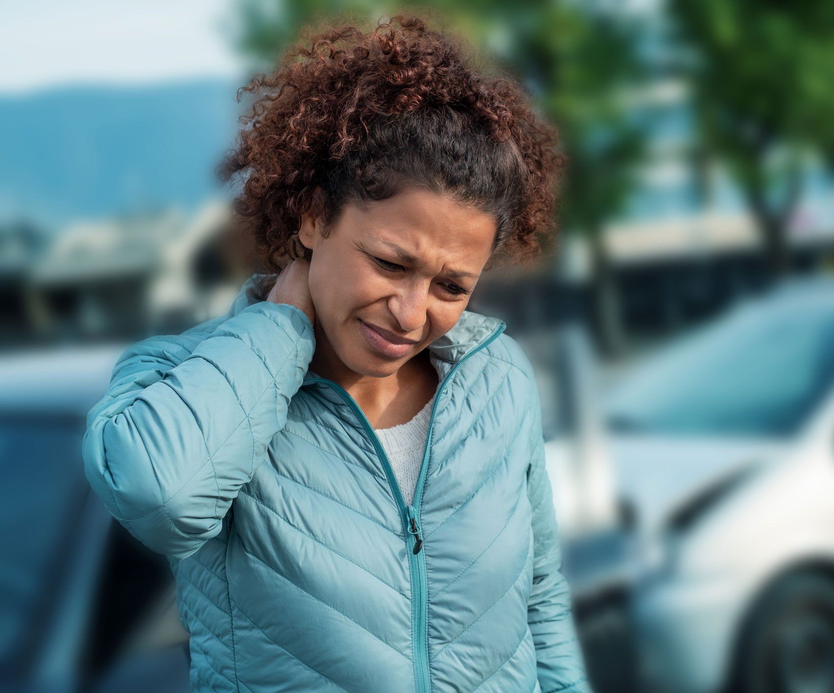 Woman Touching Neck — Ewa Beach, HI — Masters Therapeutic Massage