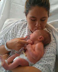Woman After Giving Birth Kissing Her Child — A Child's Dream