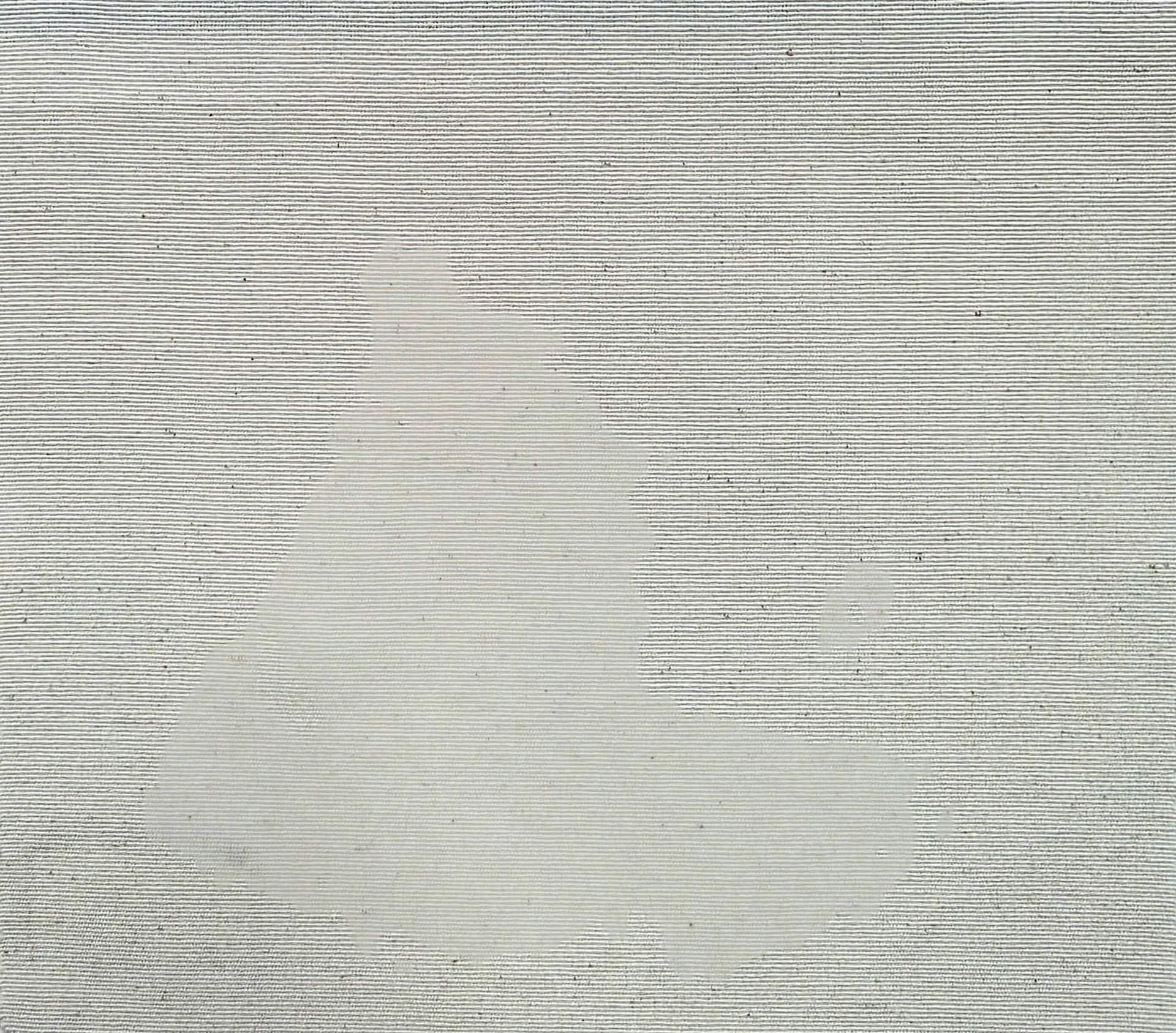 Un primer plano de un trozo de tela blanca sobre una mesa.