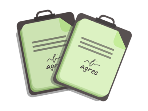 Two green clipboards with the words `` agree '' written on them.