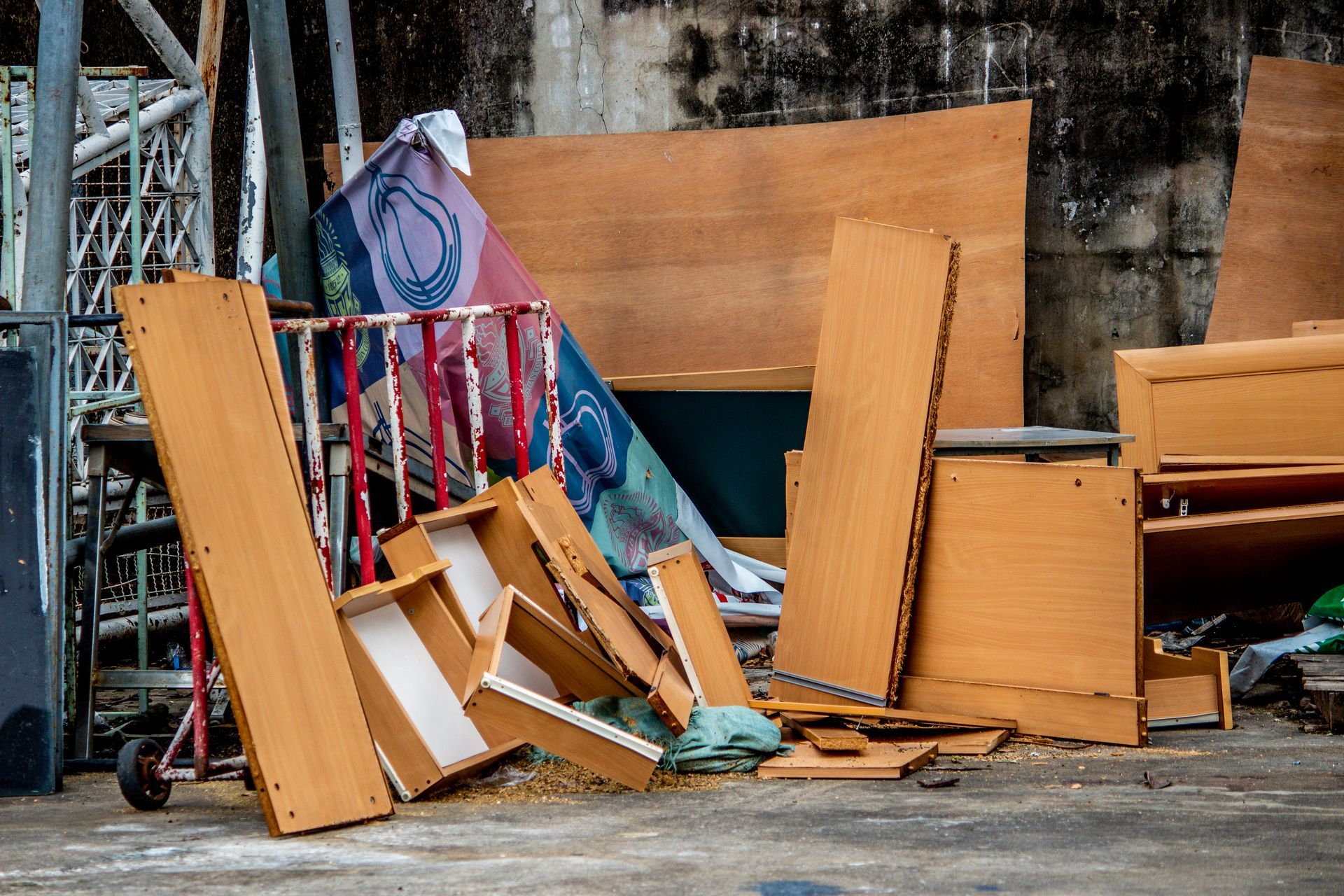 A pile of wood is sitting on the ground.