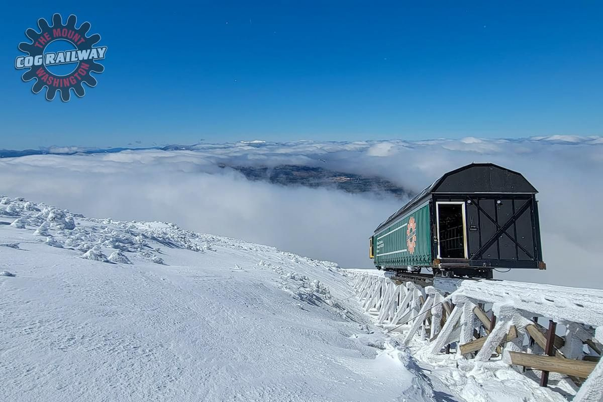 Winter ride on the Mount Washington Cog Railway climbing through snow-covered terrain.