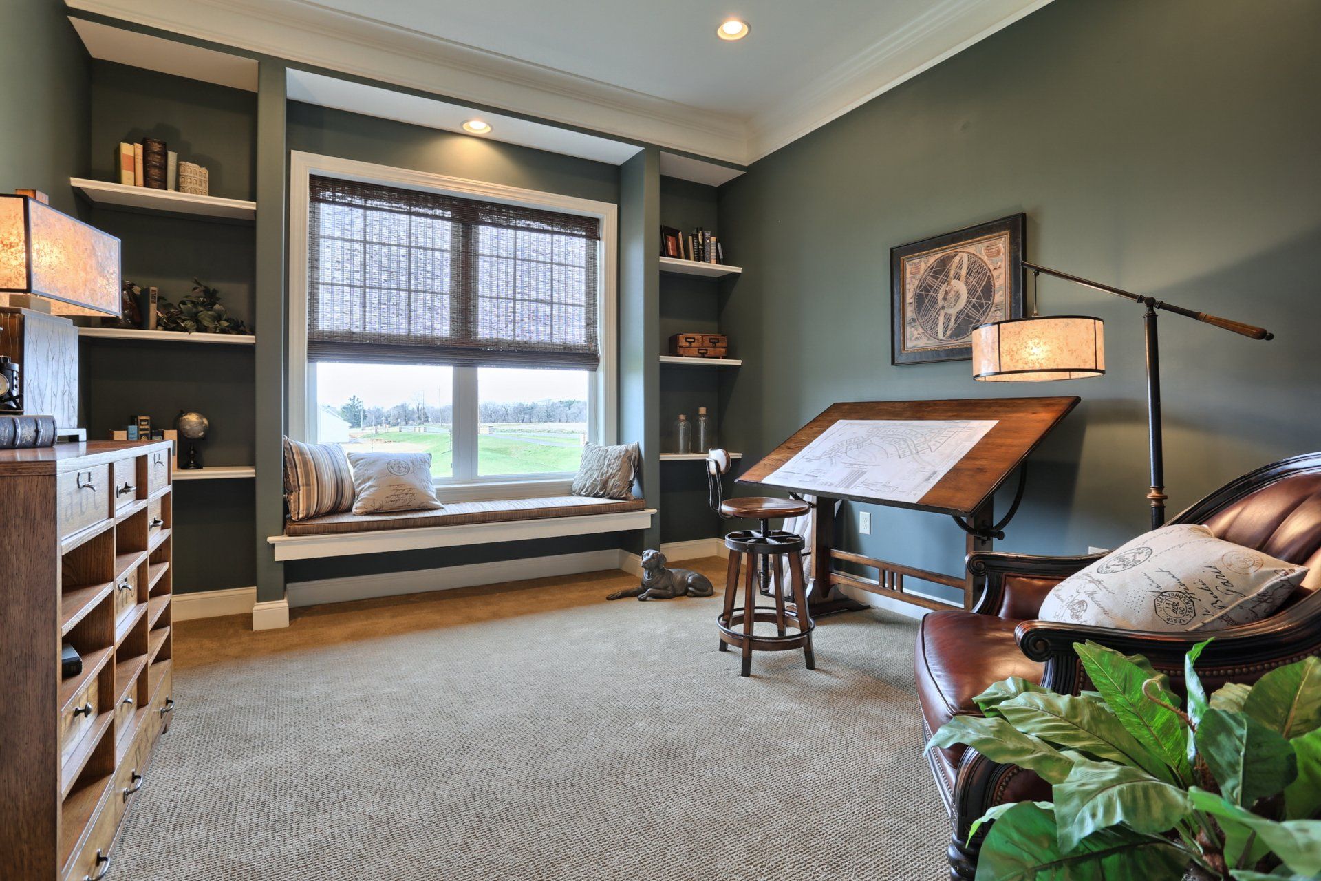 Built in shelves flank window in at home office by Landmark Homes in PA