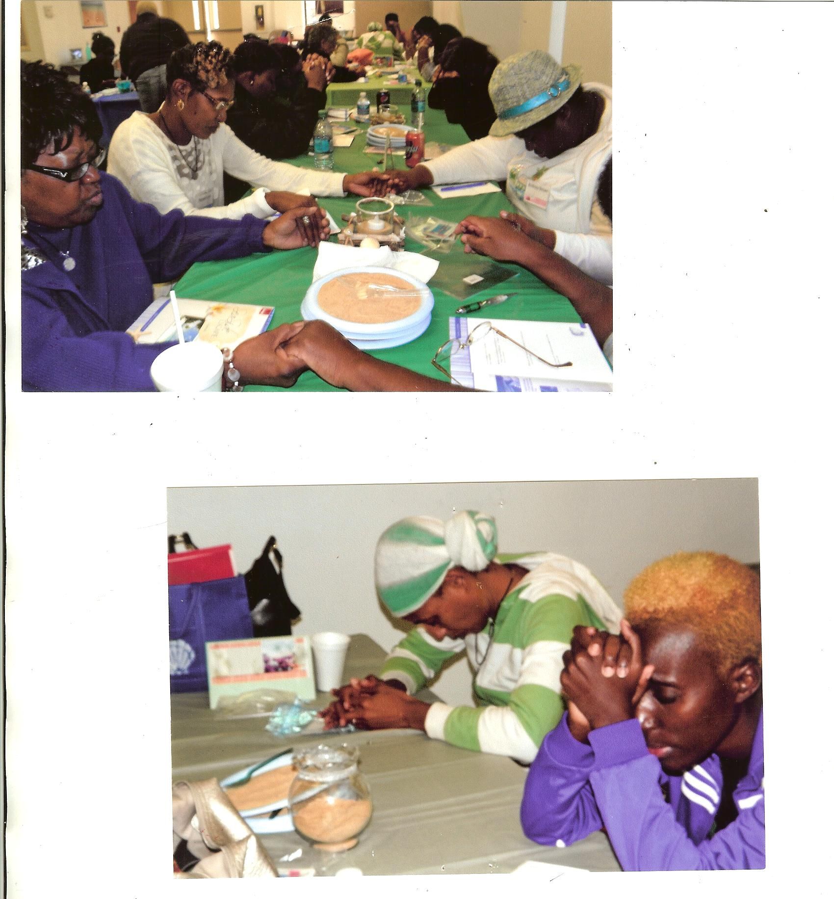 A group of people are sitting at a table with plates on it