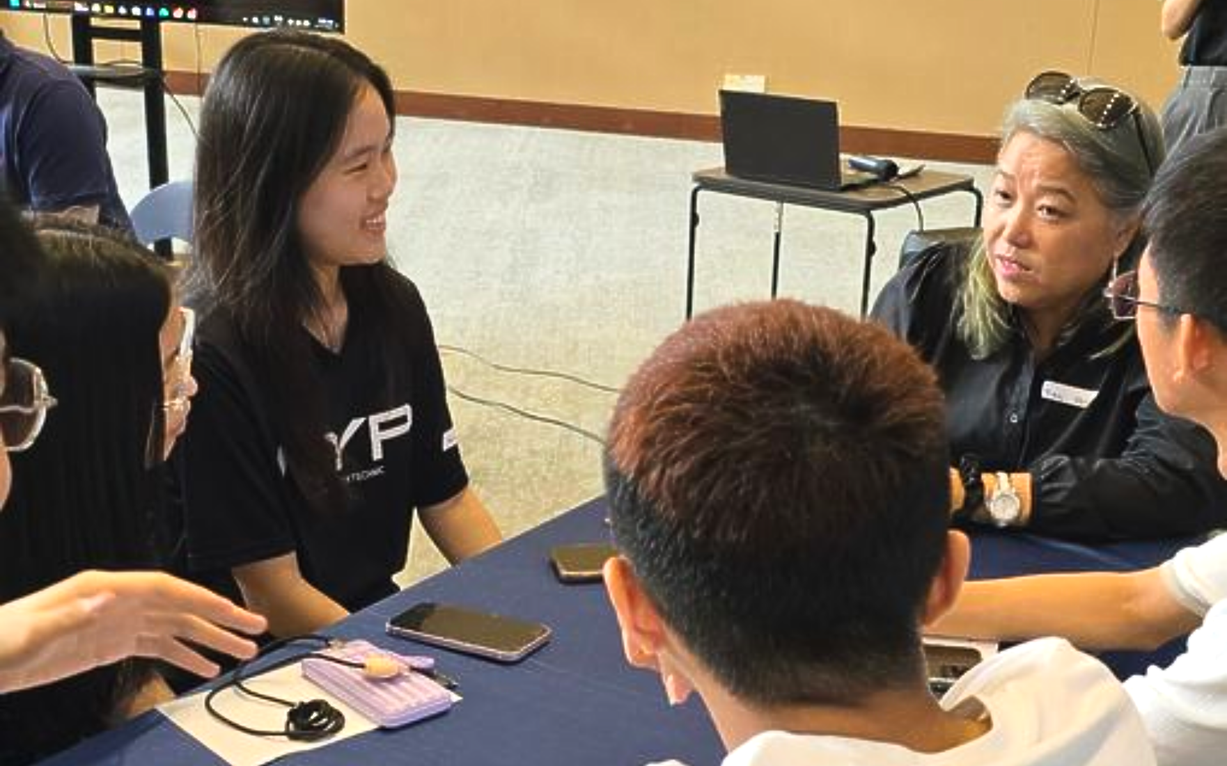 Coach Masni is coaching a group of people