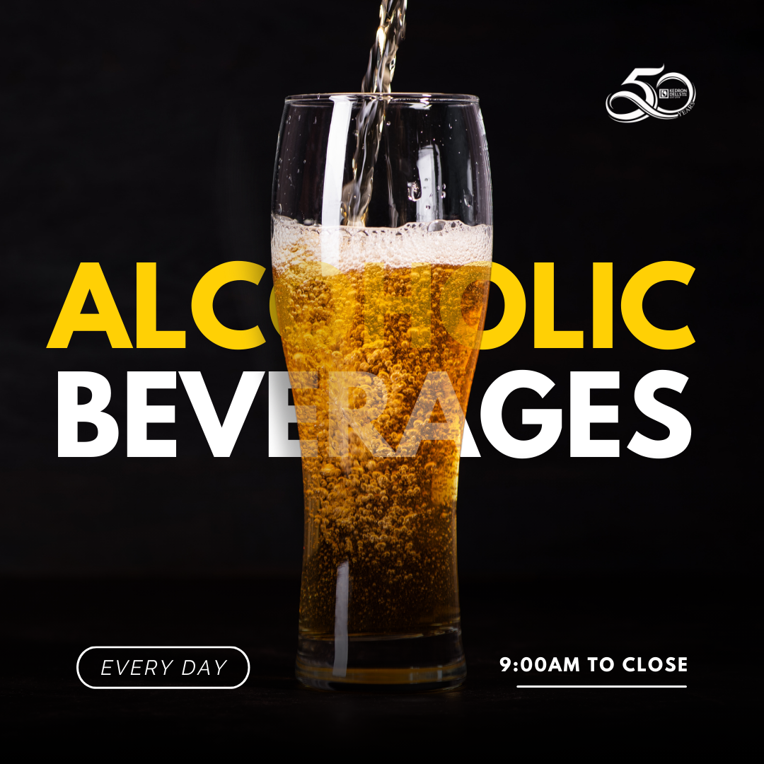 A glass of beer is being poured into a glass in front of the words "Alcoholic Beverages"