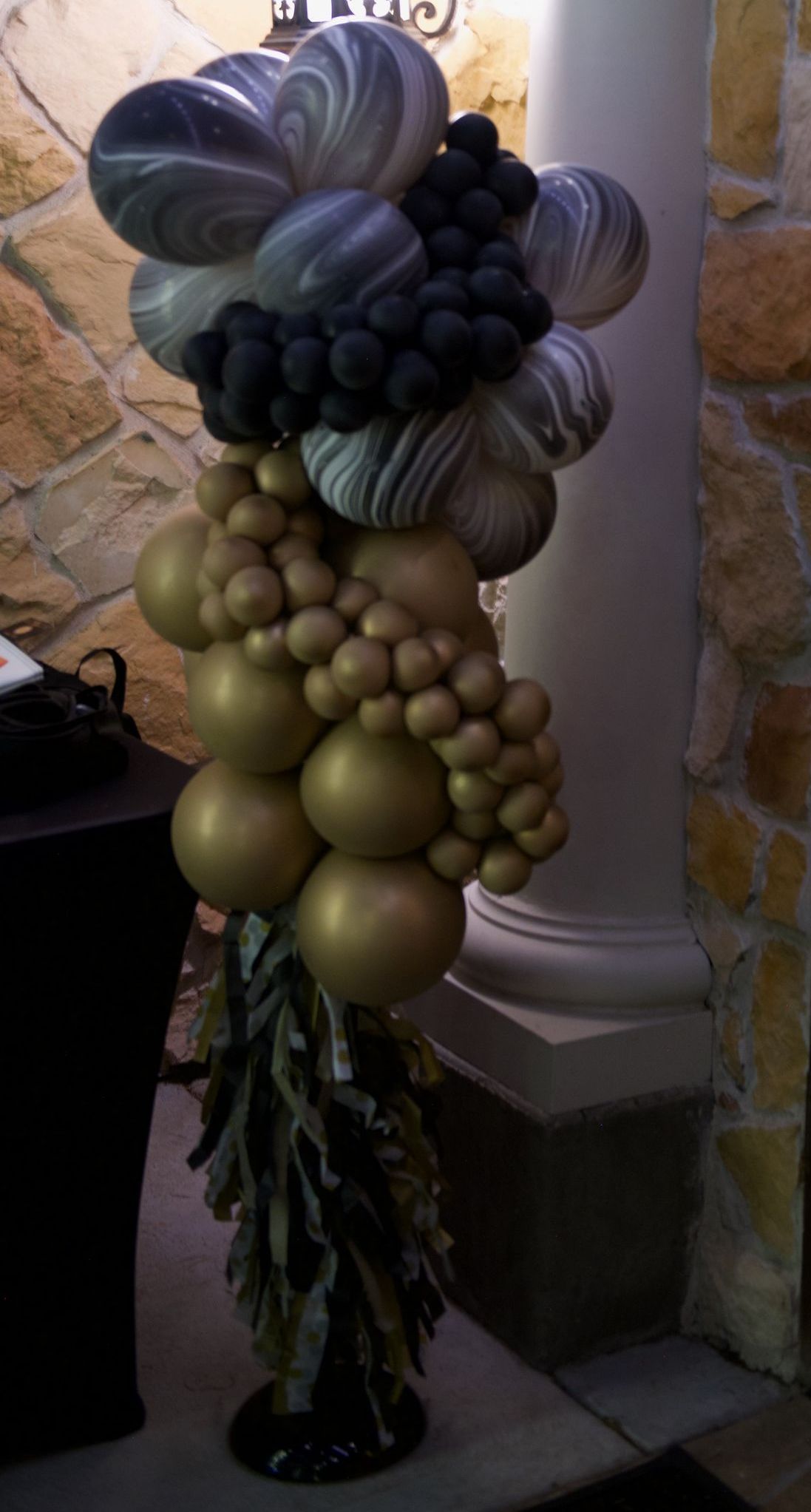 A bunch of balloons are stacked on top of each other