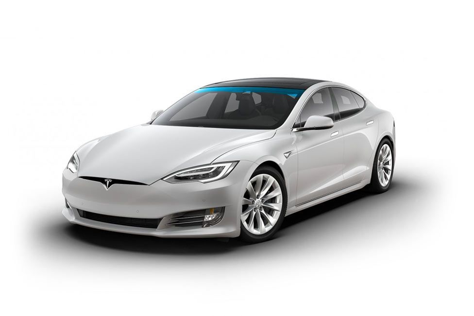 A white tesla model s is shown on a white background.