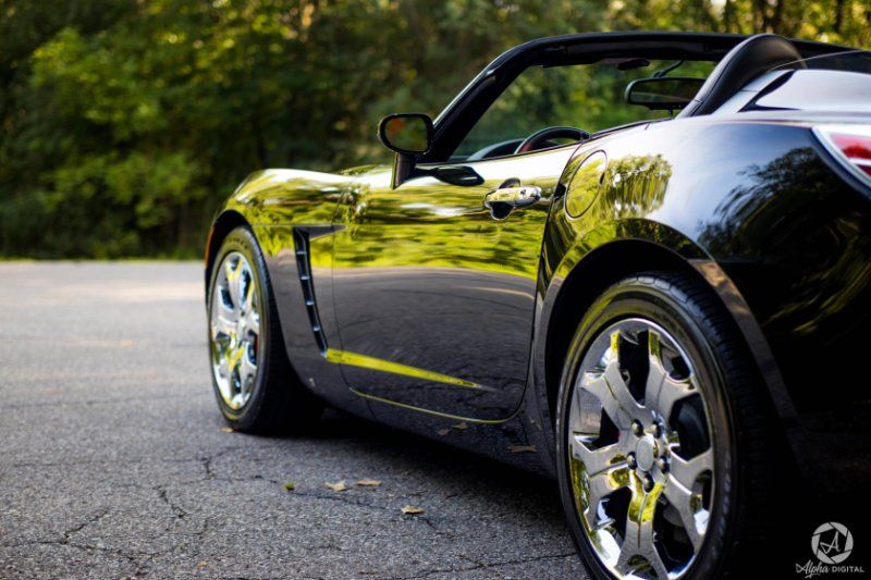 black vehicle protected by ceramic coating