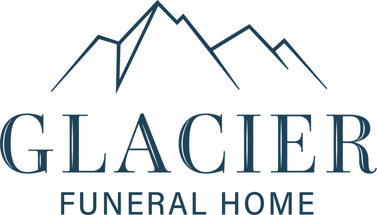 a logo for glacier funeral home with mountains in the background