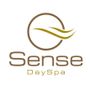 Logo für Sense Day Spa: brauner Kreis mit goldenen Wellen über dem braunen Text „Sense DaySpa“.