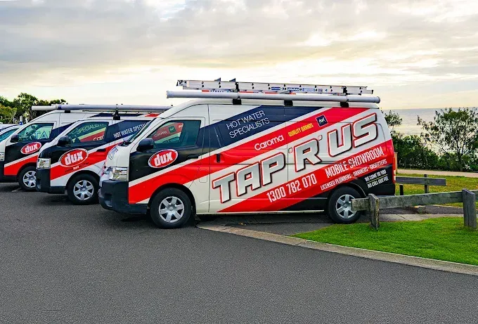 Gray Pvc Pipes Installed in a Trench in a Yard — Taps 'R' Us in Kunda Park, QLD