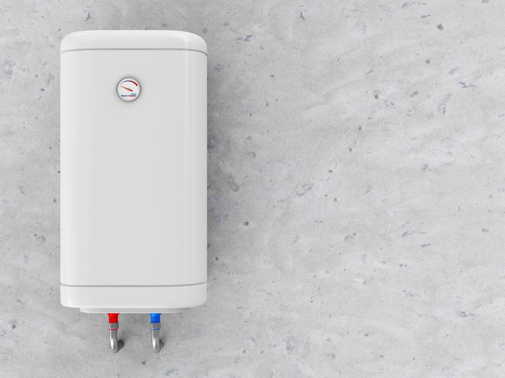White Water Heater Mounted on a Textured Gray Wall — Taps 'R' Us in Sippy Downs, QLD