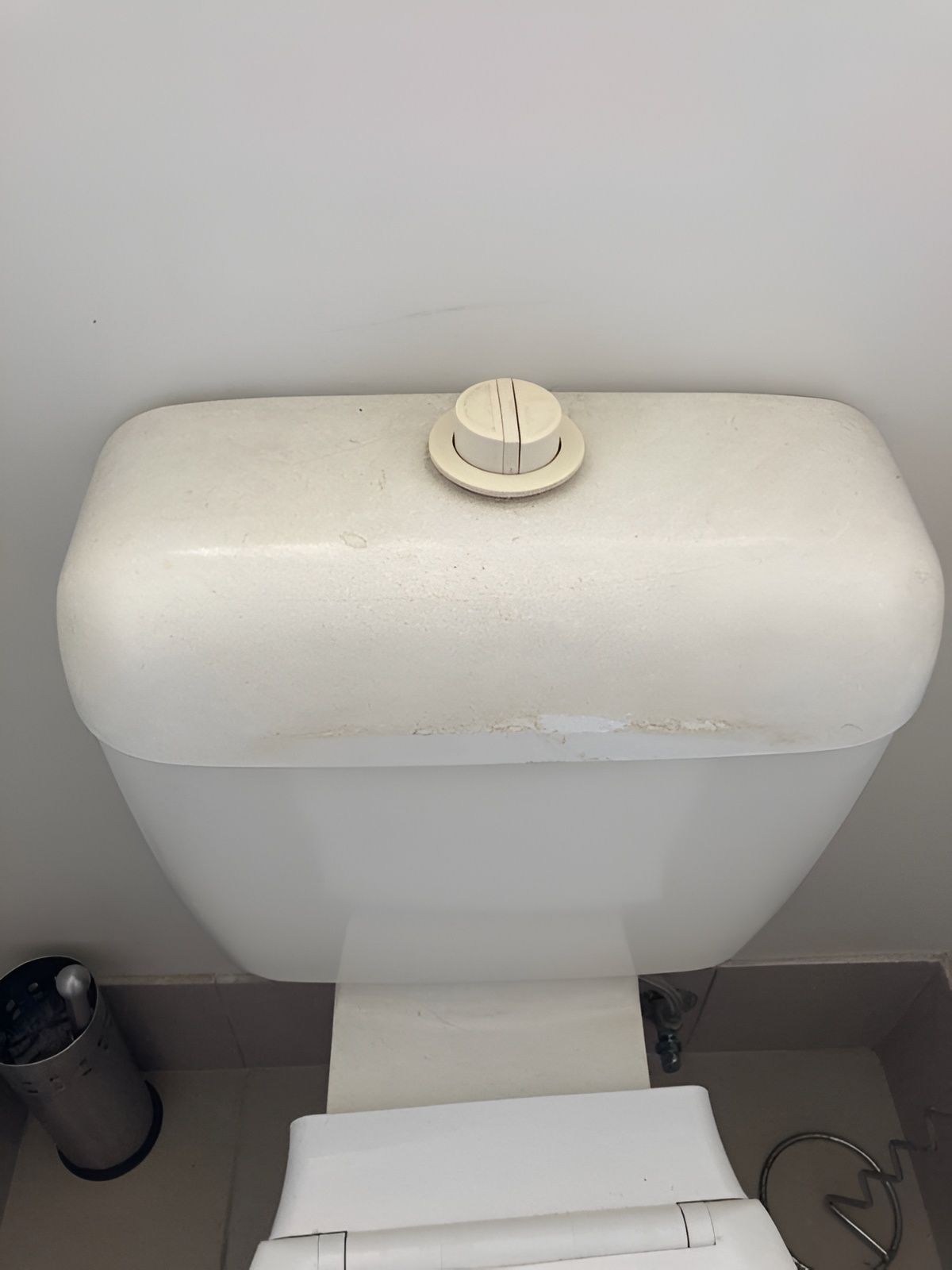 Toilet With Off-white Tank and Flush Button — Taps 'R' Us in Mountain Creek, QLD