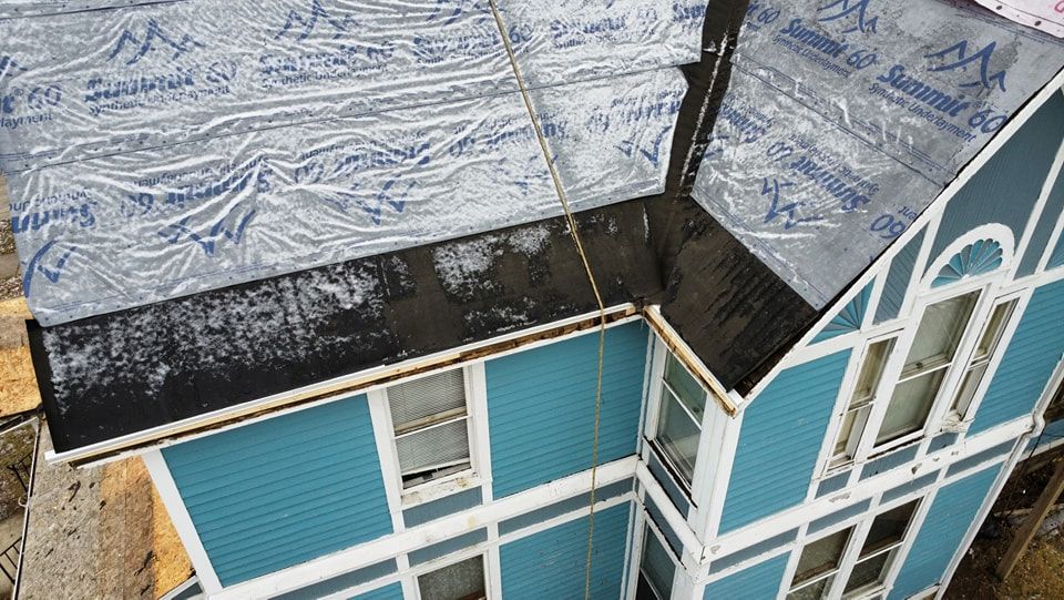 Worker Installing a New Roof — Wausau, WI — CW Custom Exteriors