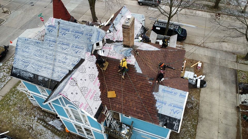 Workers Installing a New Roof — Wausau, WI — CW Custom Exteriors