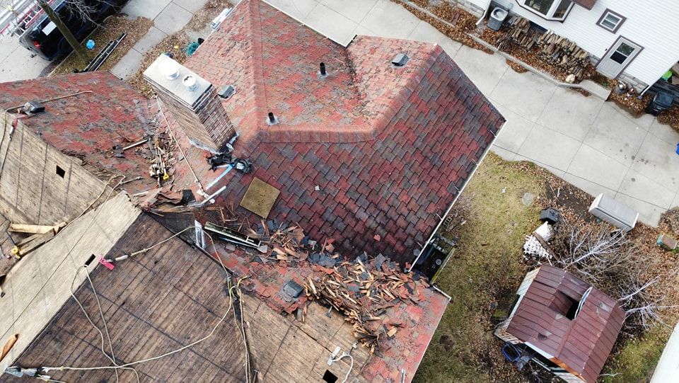 Old Roof of Home — Wausau, WI — CW Custom Exteriors