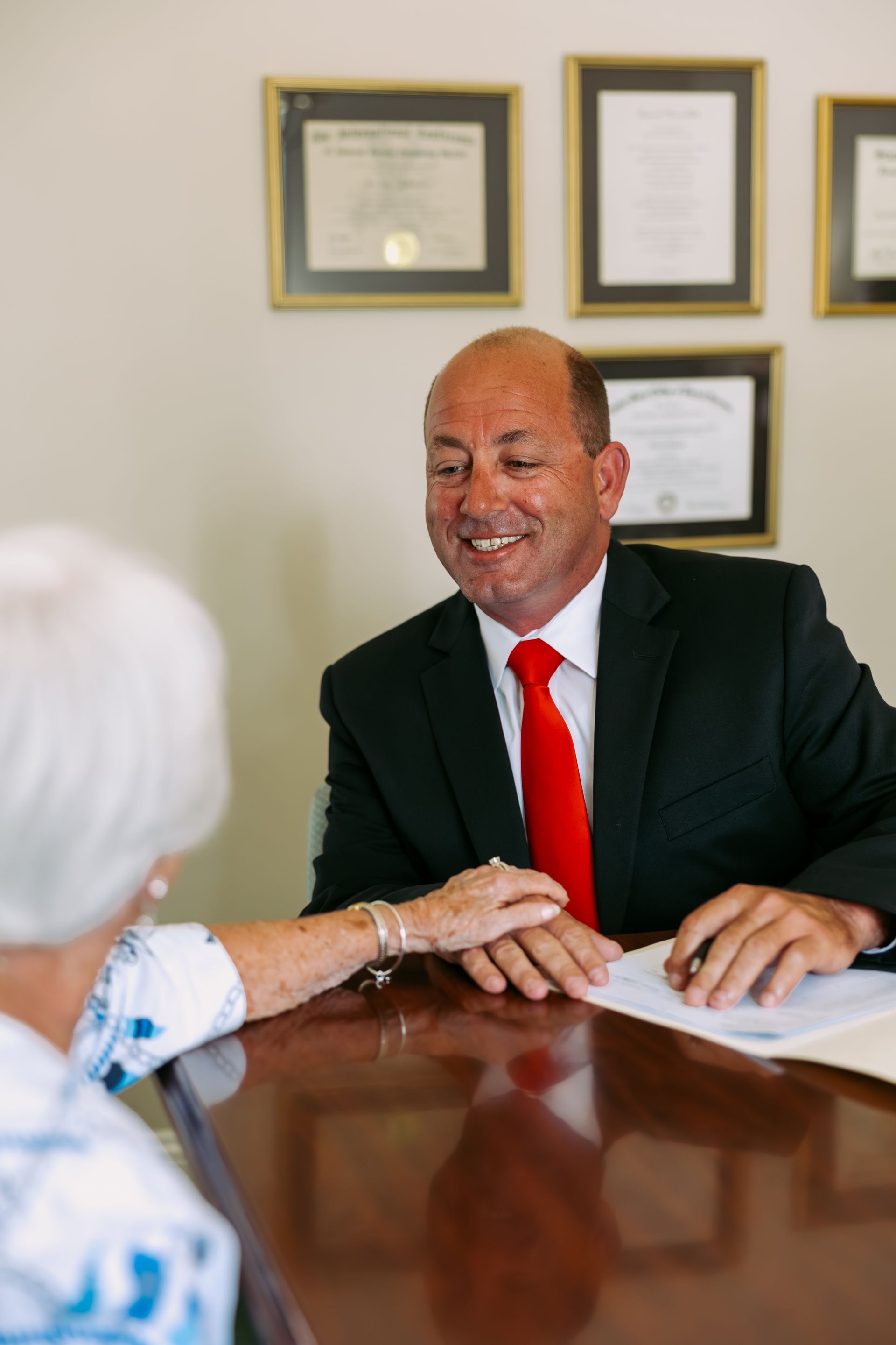 Man and  Woman at table doing paperwork