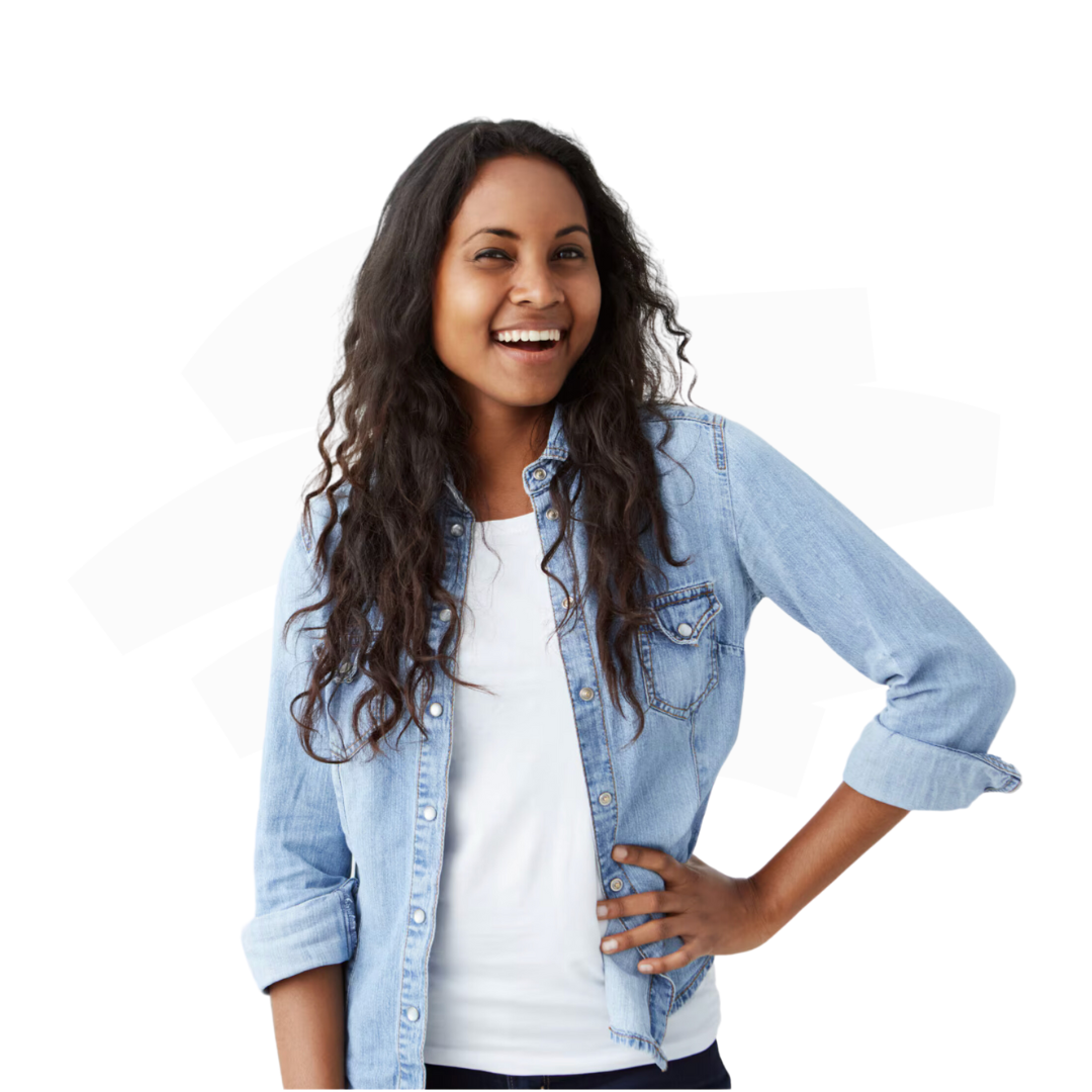 A woman wearing a denim shirt and a white shirt is smiling.