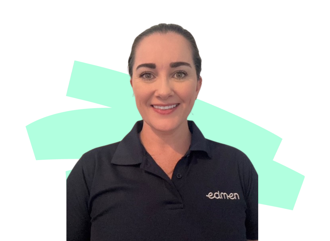 A woman wearing a blue shirt with the letter e on it is smiling.