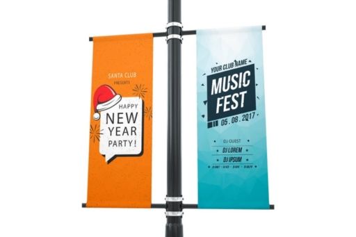 Two banners on a pole one of which says new year party and the other says music fest.