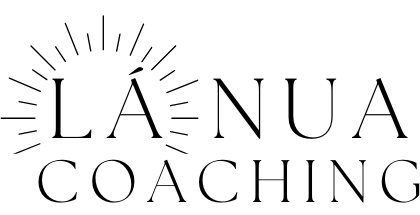 A black and white logo for la nua coaching.