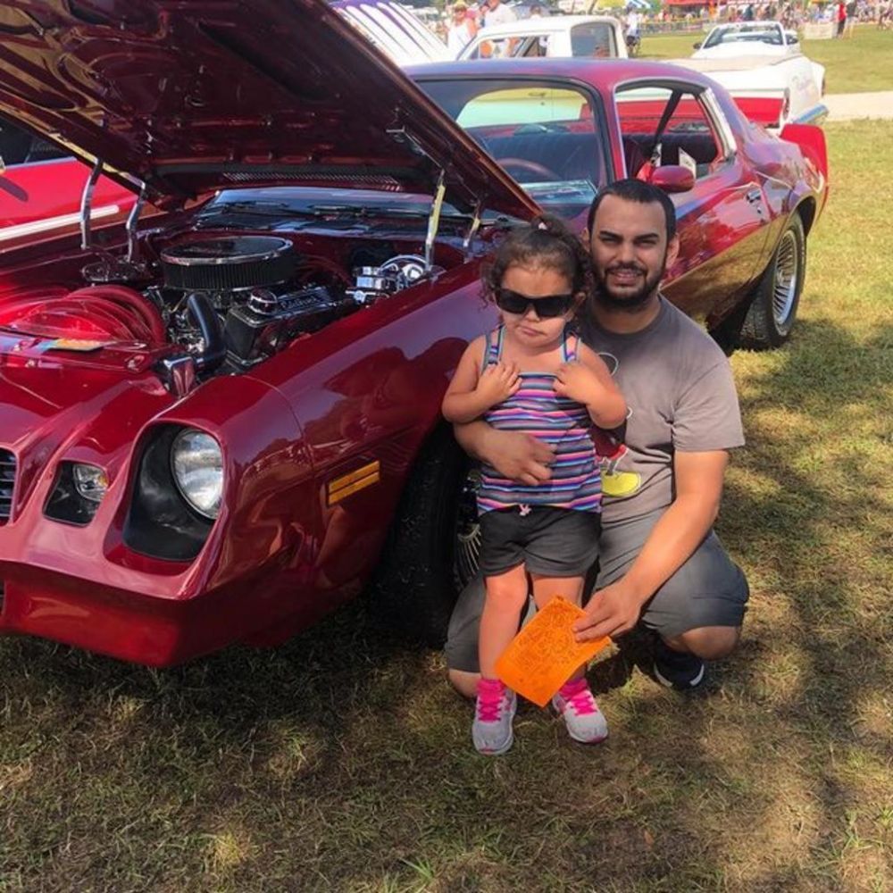 Customers Close by a Vehicle in Naples, FL - Proline Auto Care