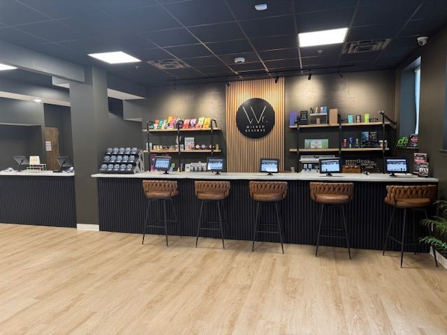 Inside Wicked Reserve Dispensary — bar-style cannabis counter in Rochester, NY