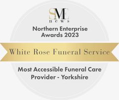 A white rose funeral service award from the northern enterprise awards
