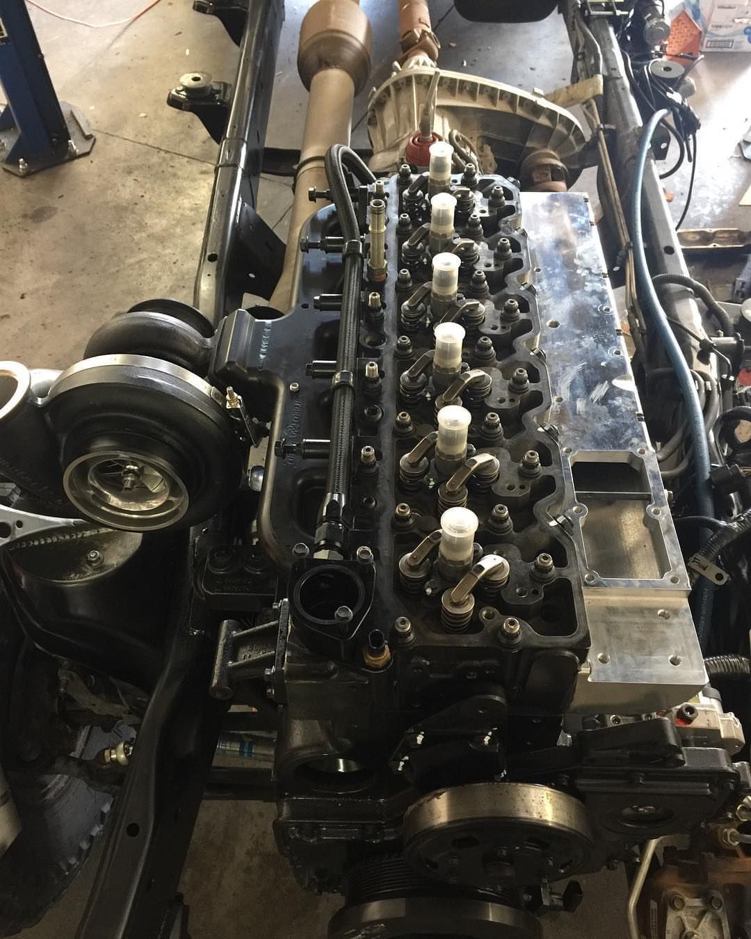 A close up of a engine with a lot of parts on it