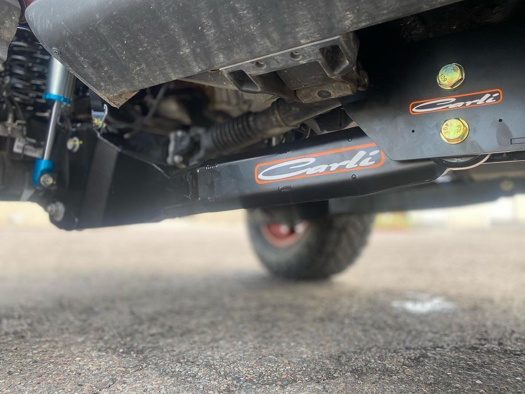 A close up of the underside of a truck.