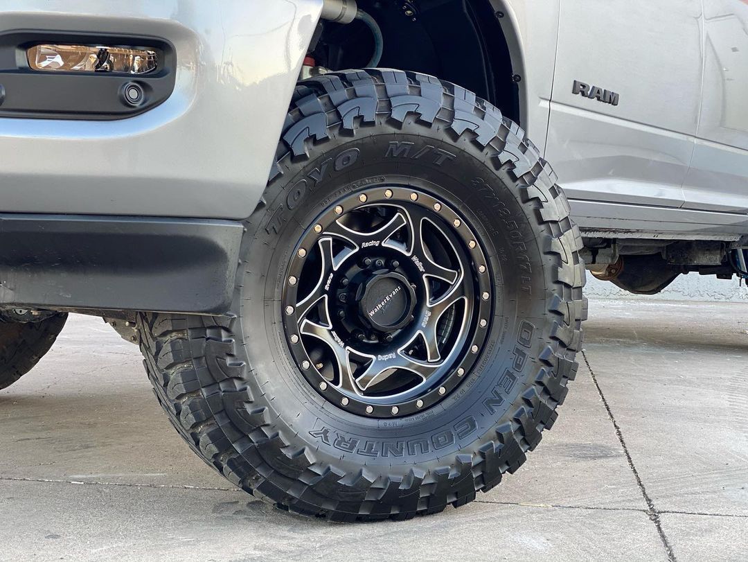 A close up of a tire on a truck.