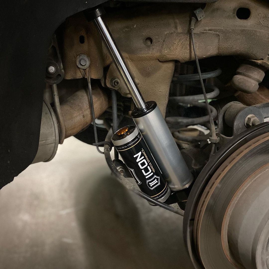 A close up of a shock absorber on a car