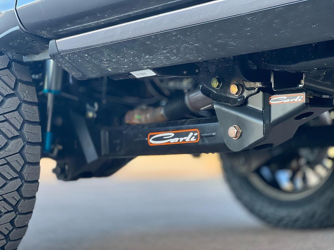 A close up of the underside of a truck.