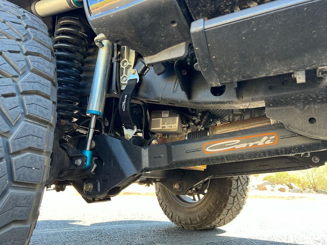 A close up of the underside of a truck.