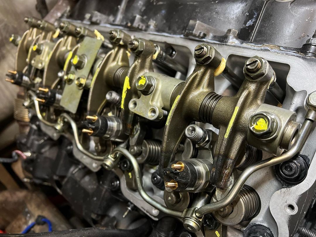 A close up of the inside of a car engine.
