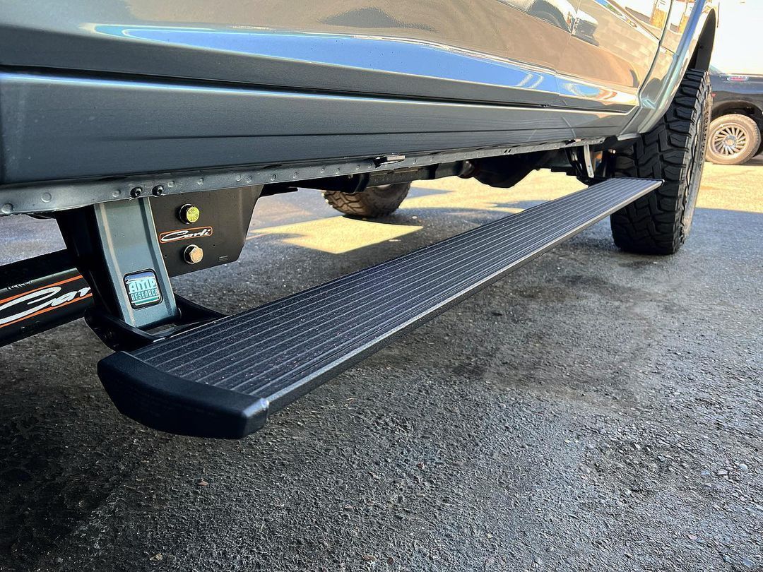 A close up of a side step on a truck.