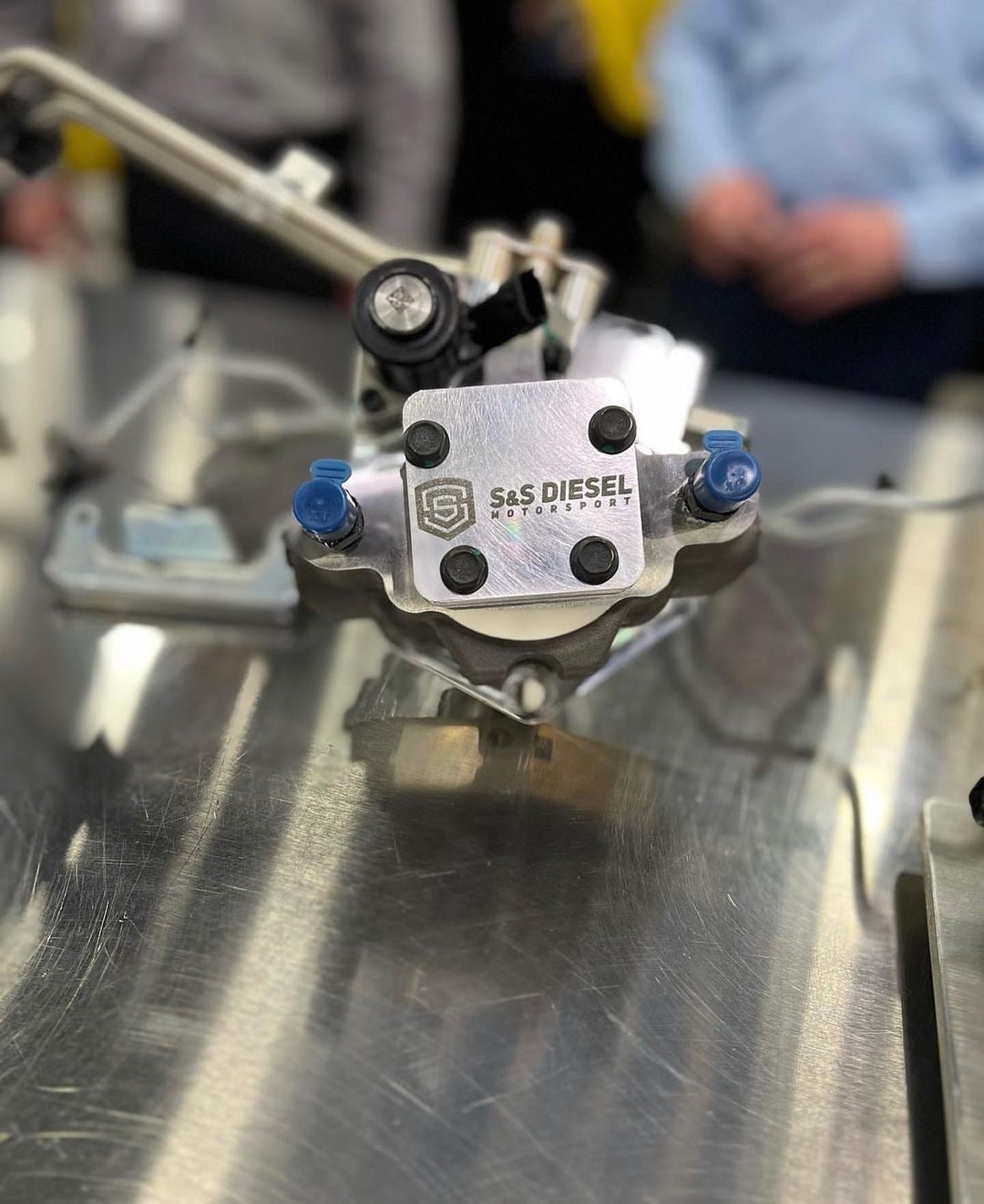 A close up of a metal object on a table.