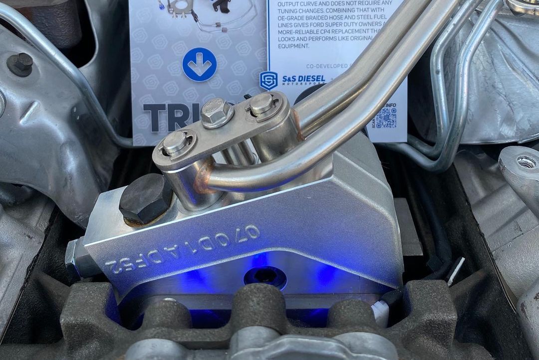 A close up of a piece of metal with the word trust on it