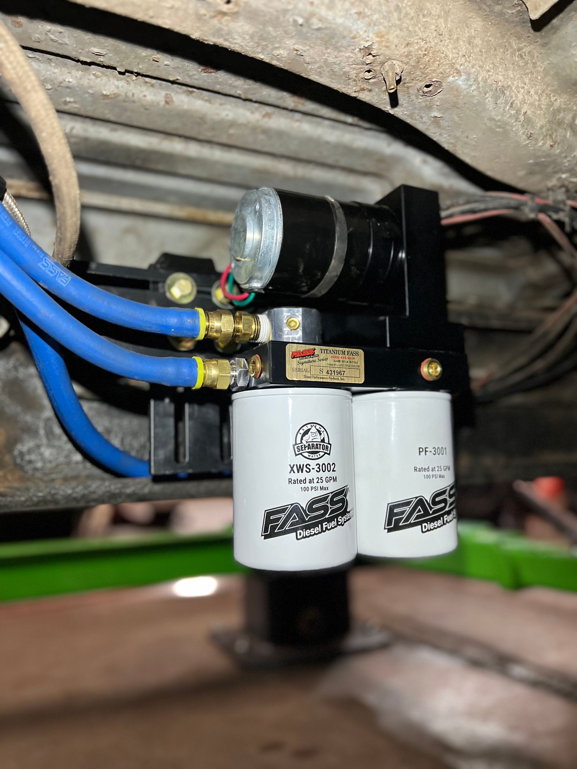 A close up of a fuel filter on a car