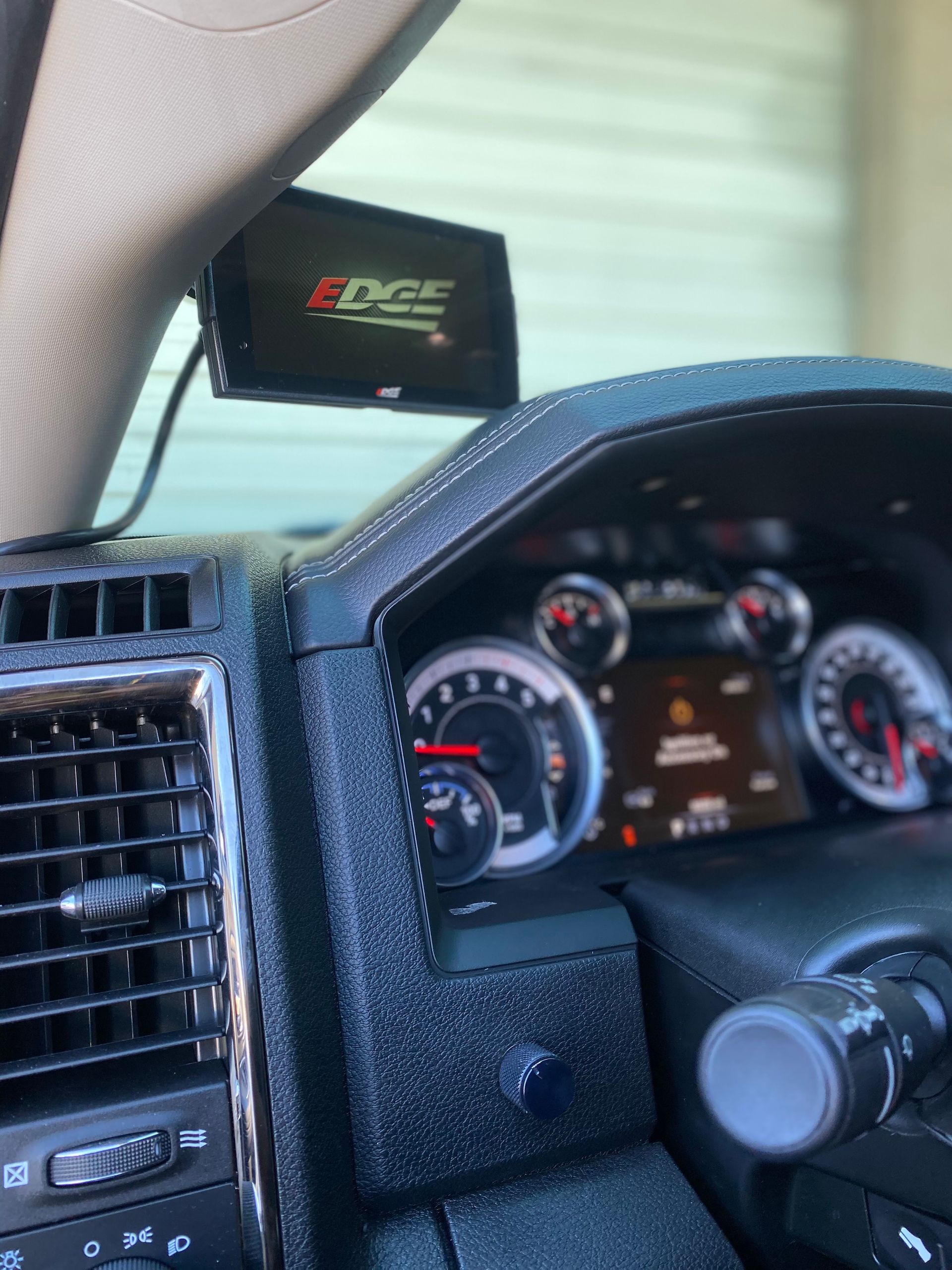 A close up of the dashboard of a dodge ram truck